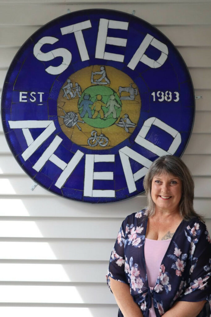 Michelle's Step Ahead mosaics sign